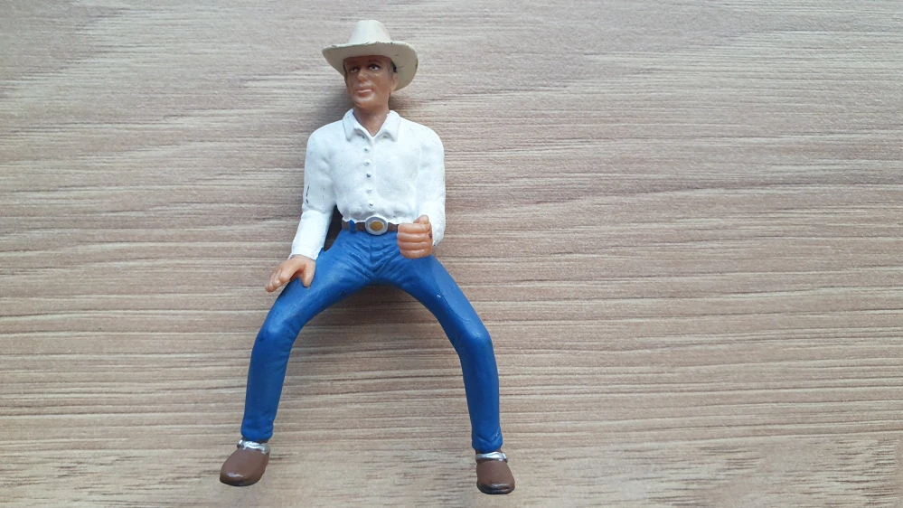 Cowboy v bílé košili
